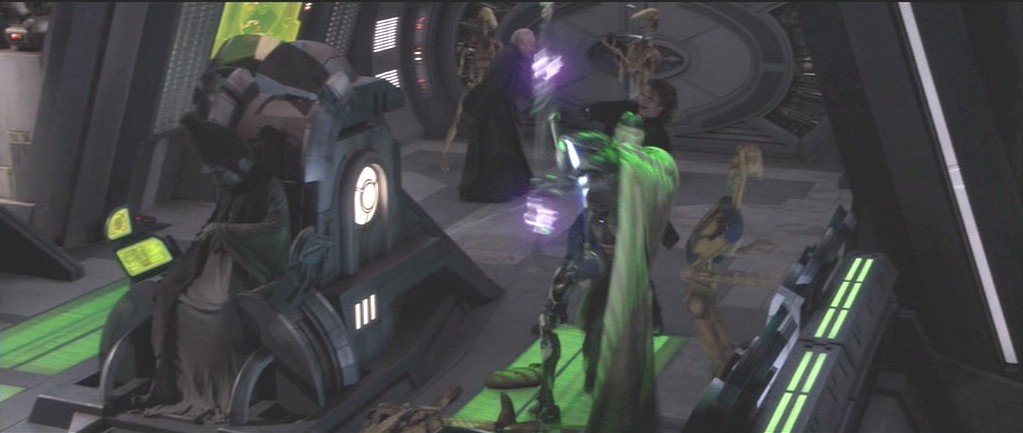 pilota droid rémülten figyeli ahogy Anakin és egy magnatestőr tőle fél méterre vívnak